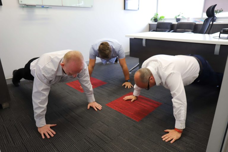 Ray, Michael and Pete from Devcon doing pushups